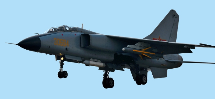 A PLAAF JH-7A fighter-bomber carrying the KD-88 missile under its wing. The targeting pod is clearly visible underneath the aircraft fuselage
